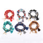 Lovra tassel pendant beaded bracelet with multicolored beads and gold-tone tassel