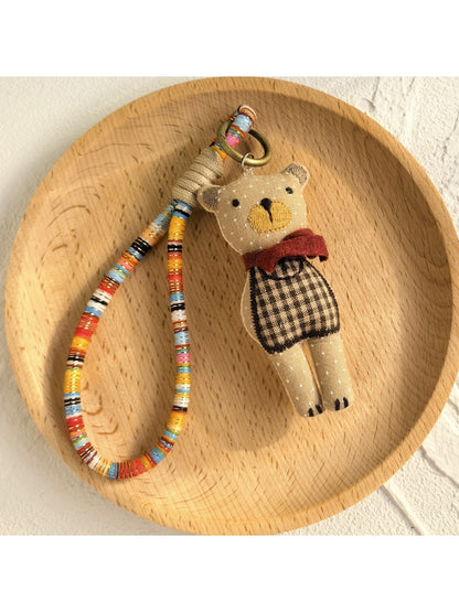 Keypus fabric doll keychain shown from an angled top view