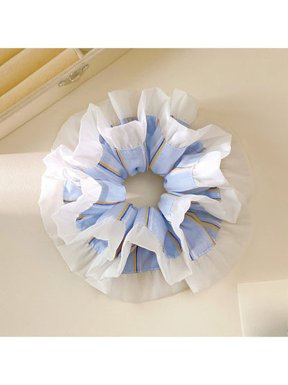 Blue striped double layer scrunchie displayed flat showing ruffle texture