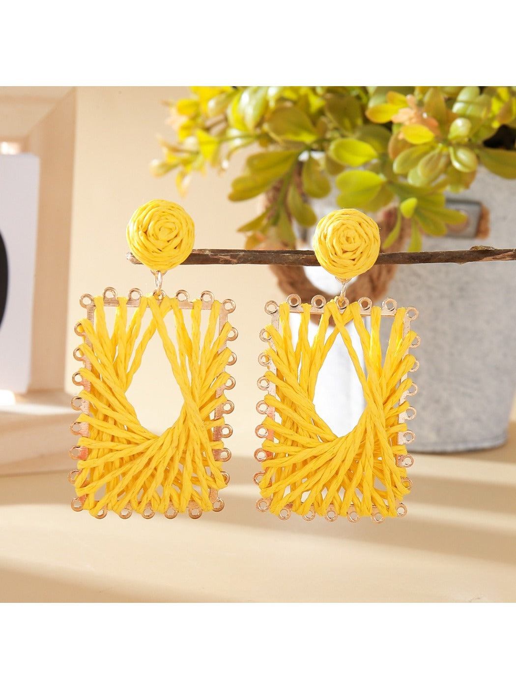 Earedge raffia wrapped square earrings styled with casual outfit