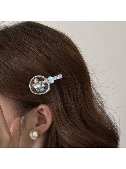 Beau hair clip displayed on a white background highlighting its elegant design