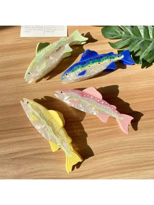 Beau elegant salmon shaped hair claw clip on white background