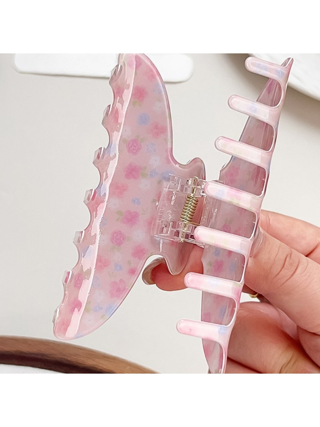 Beau Sweet Pink Floral Print Hair Claw Clip holding hair in a half-up style