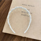 Model styling Gifty wavy headband with casual outfit and natural makeup