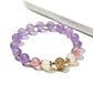 Close-up of Lovra vintage purple beaded bracelet with round and faceted beads