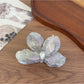 Top view of Beau acetate moth orchid claw clip showing smooth finish