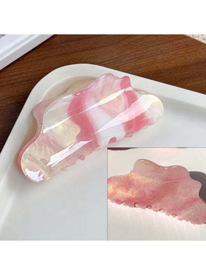 Beau cloud shaped hair claw clip in pastel blue color variant on white background