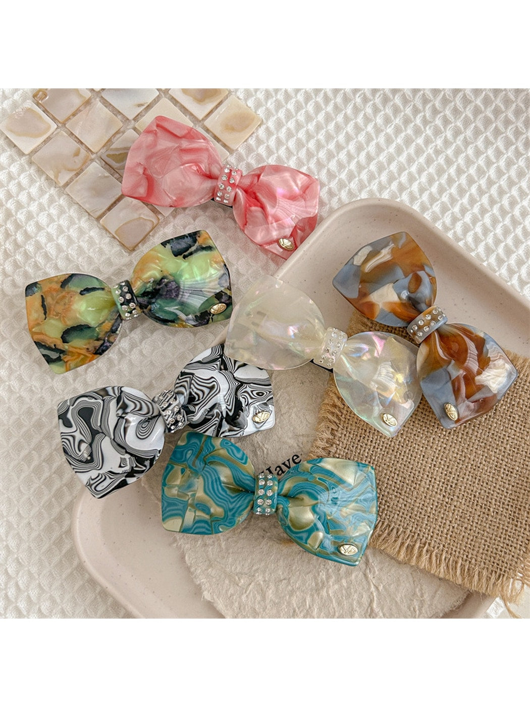 Beau - Marbled Acetate Bow Spring Hair Clip