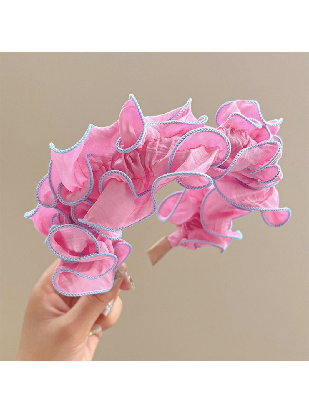 Model wearing Gifty ruffle pleated fabric headband with casual outfit