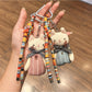 Keychain with classic cat charm attached to a set of keys