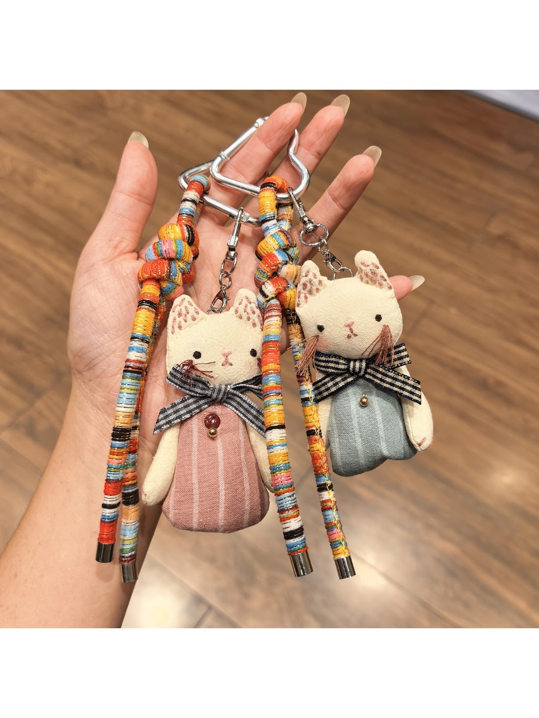 Keychain with classic cat charm attached to a set of keys