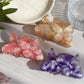 Close-up of Beau hair claw clip showing detailed colorful butterfly design