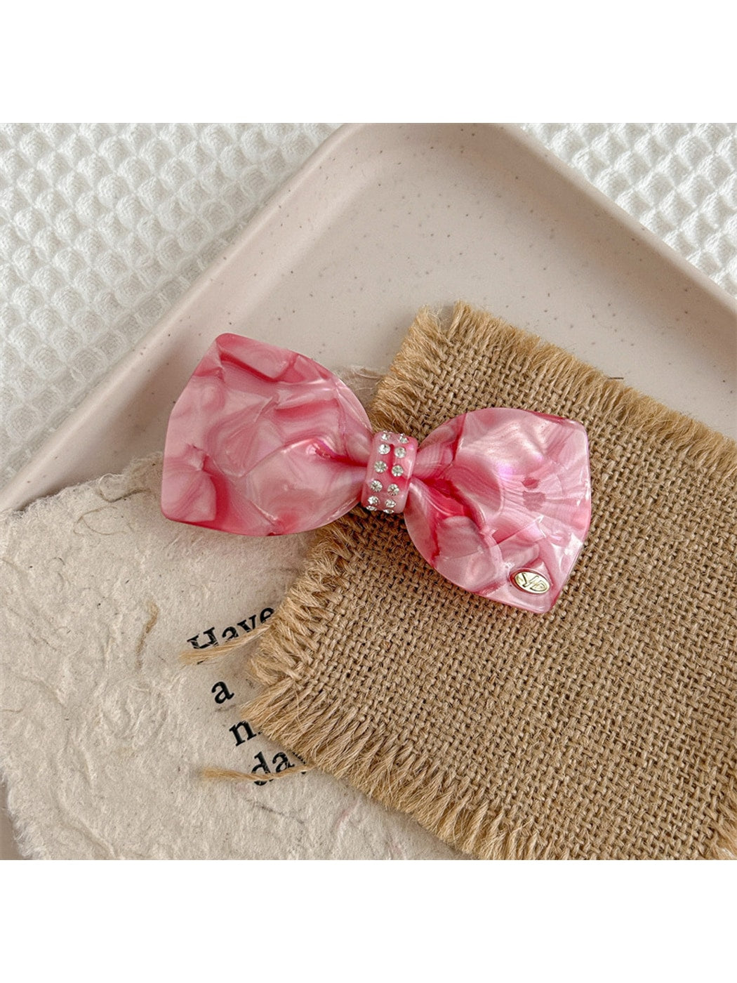 Beau - Marbled Acetate Bow Spring Hair Clip