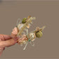 Close-up of Beau 3D flower hair clip showing petal details