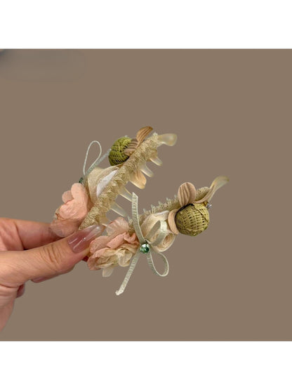 Close-up of Beau 3D flower hair clip showing petal details