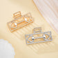 Side angle of Beau Mysterious Retro Square Hair Clip showing clip mechanism