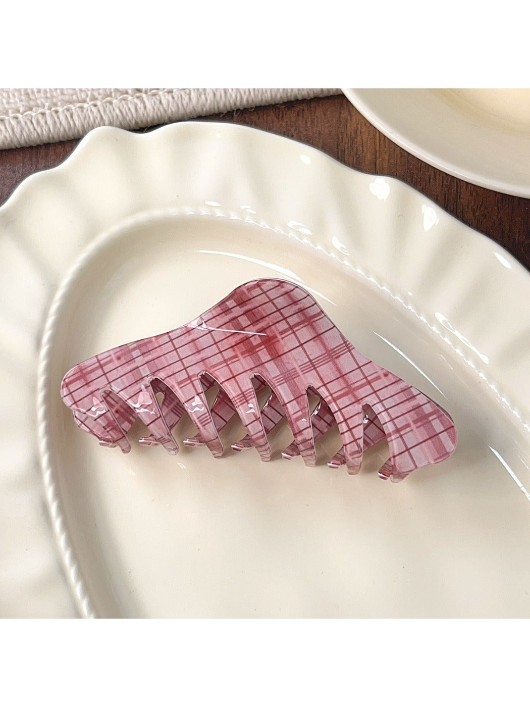 Beau pink plaid crescent claw clip clipped in long brown hair