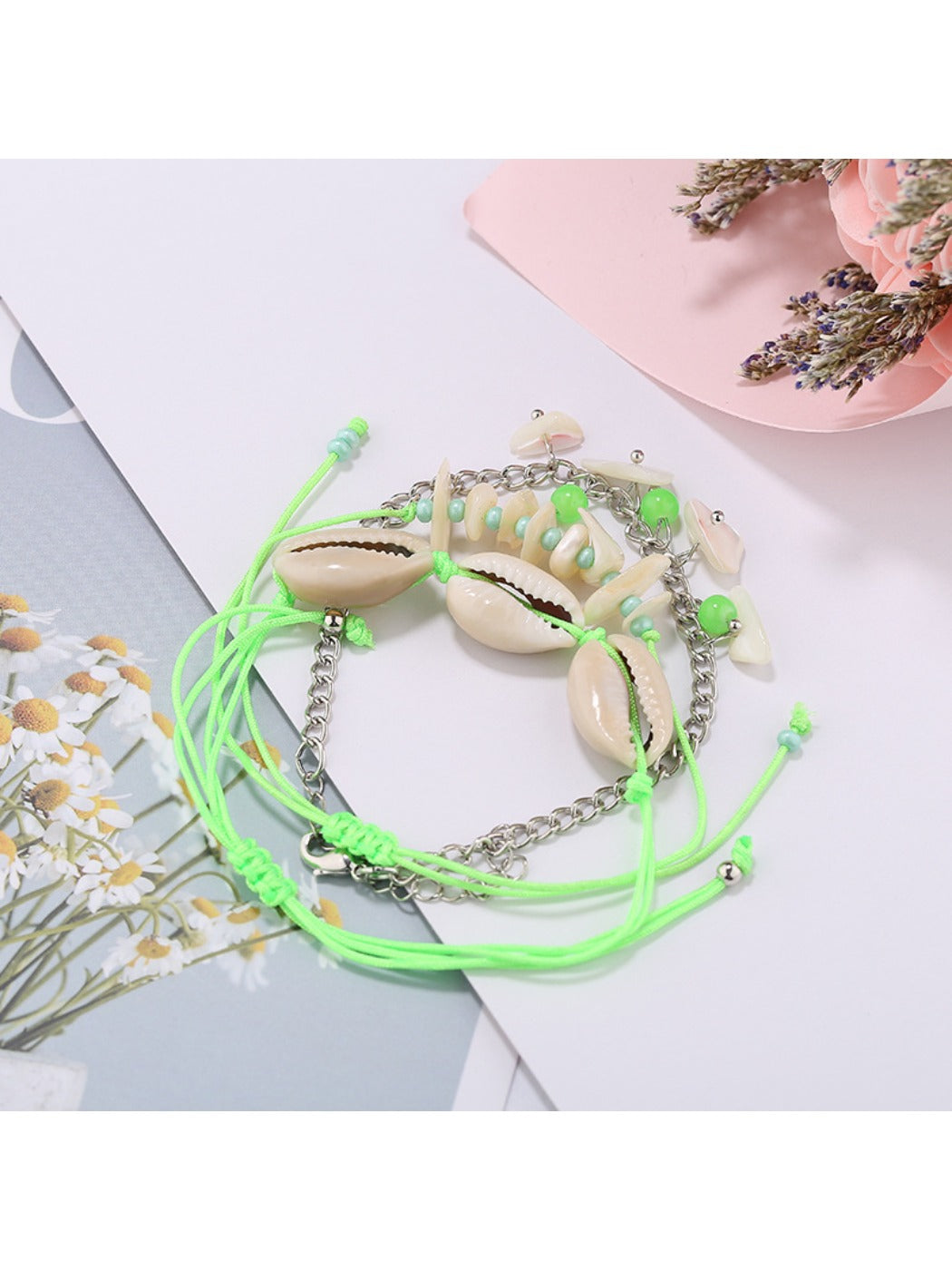 Lovra bracelet styled with casual summer outfit on a model's wrist
