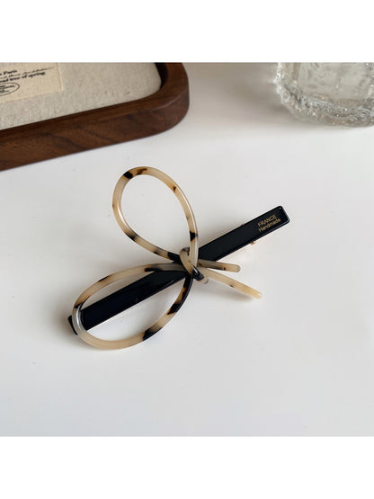Beau - Openwork Bow Hair Clip