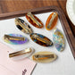 Side view of Beau Sweet Oval Acetate Hair Clip highlighting metal clasp mechanism