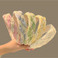 Gifty Happy Lace colored headband in pastel pink with intricate lace design