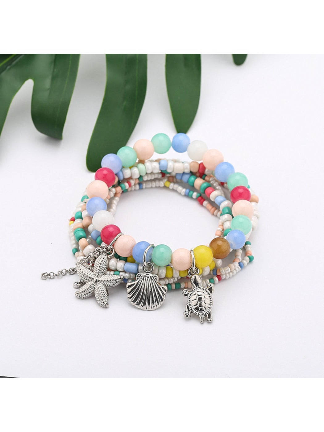 Detailed shot of Lovra bracelet beads showing texture and color variety