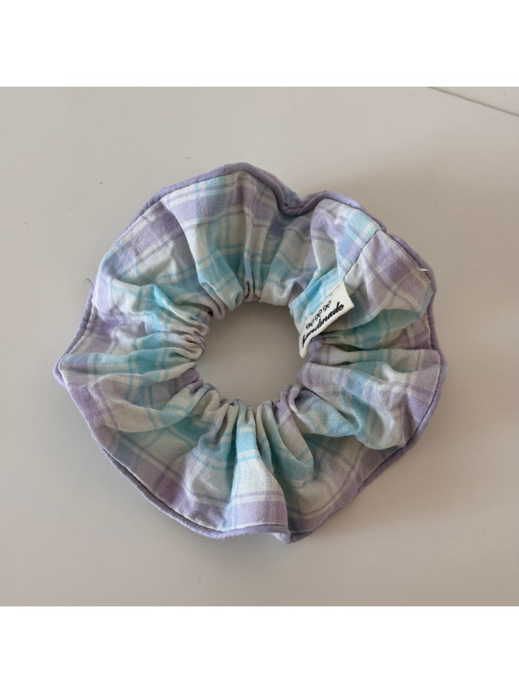 Gifty checkered bow ribbon scrunchie styled in a ponytail