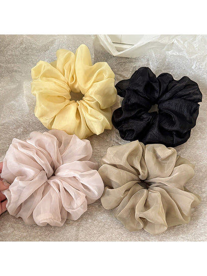 Gifty classy scrunchie displayed on a white background showing its texture