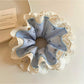 Close-up of Gifty bow print ruffled scrunchie in pastel colors on white background