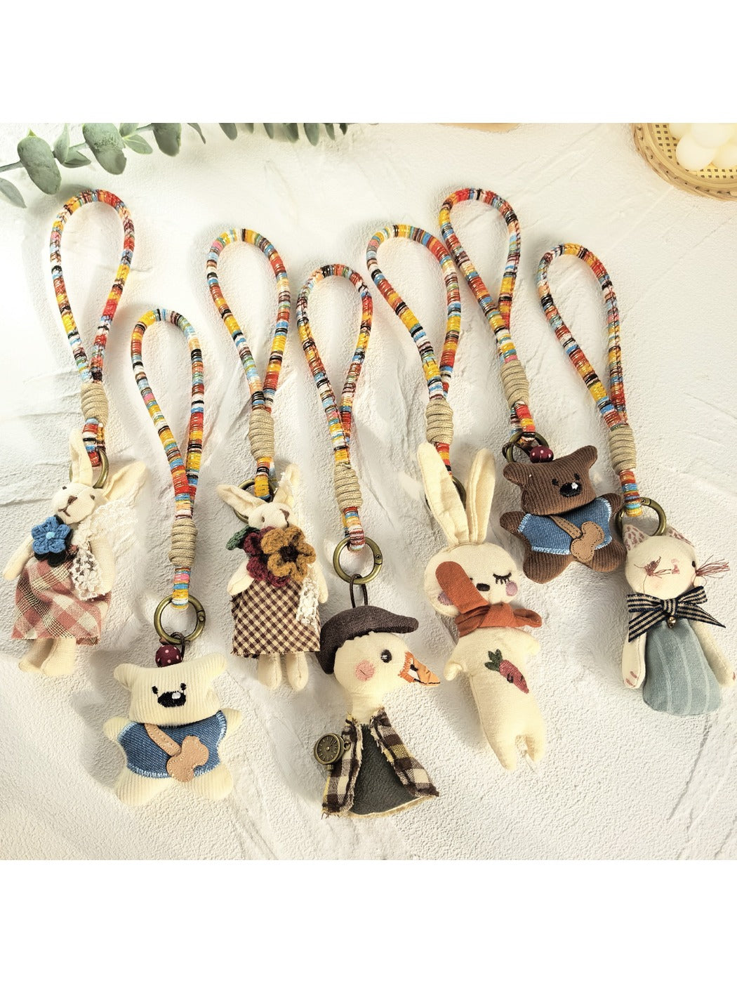 Close-up of Keypus fabric cartoon doll keychain showing detailed stitching and facial features