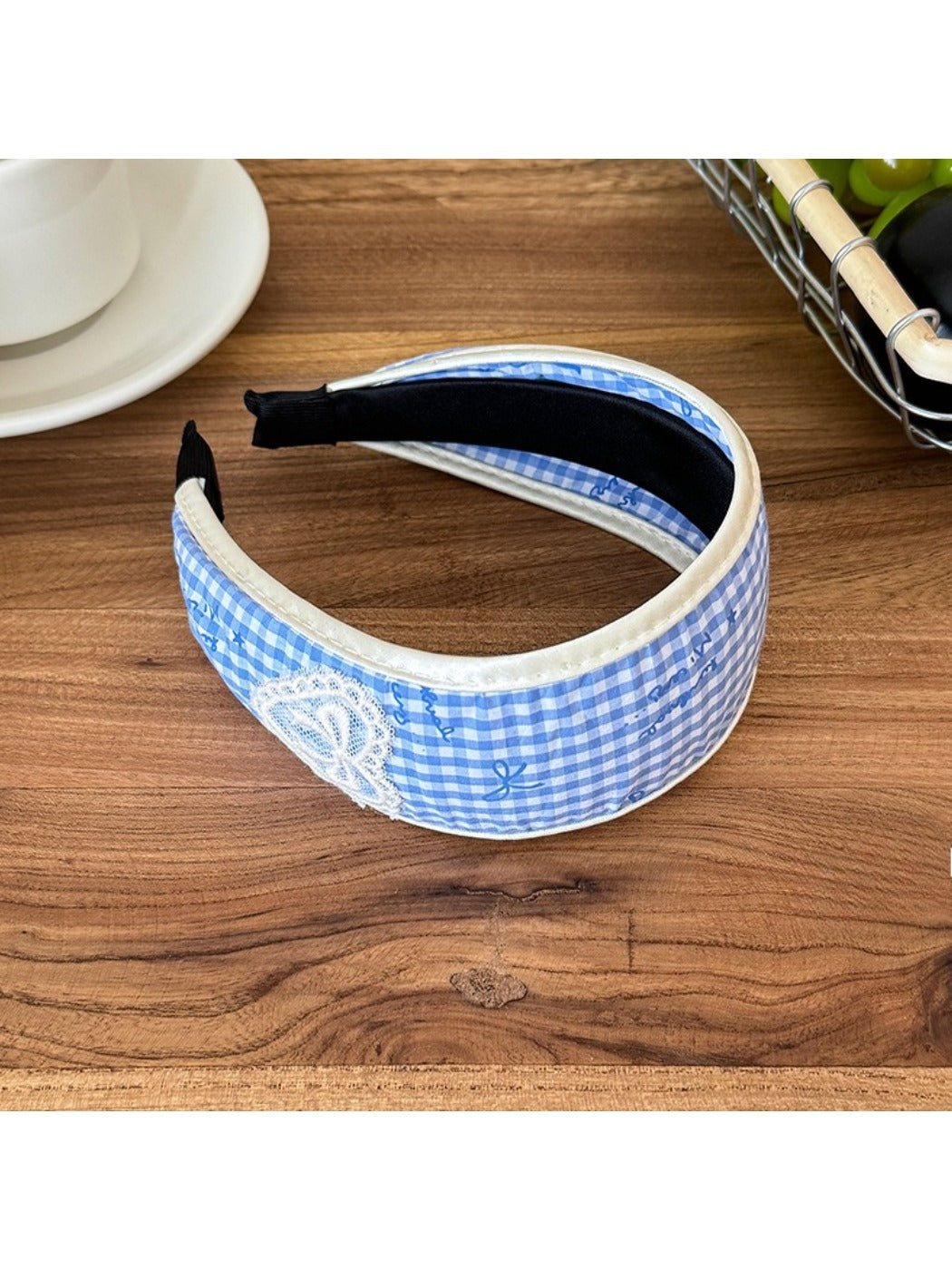 Side view of Gifty plaid bow print headband highlighting bow shape and design