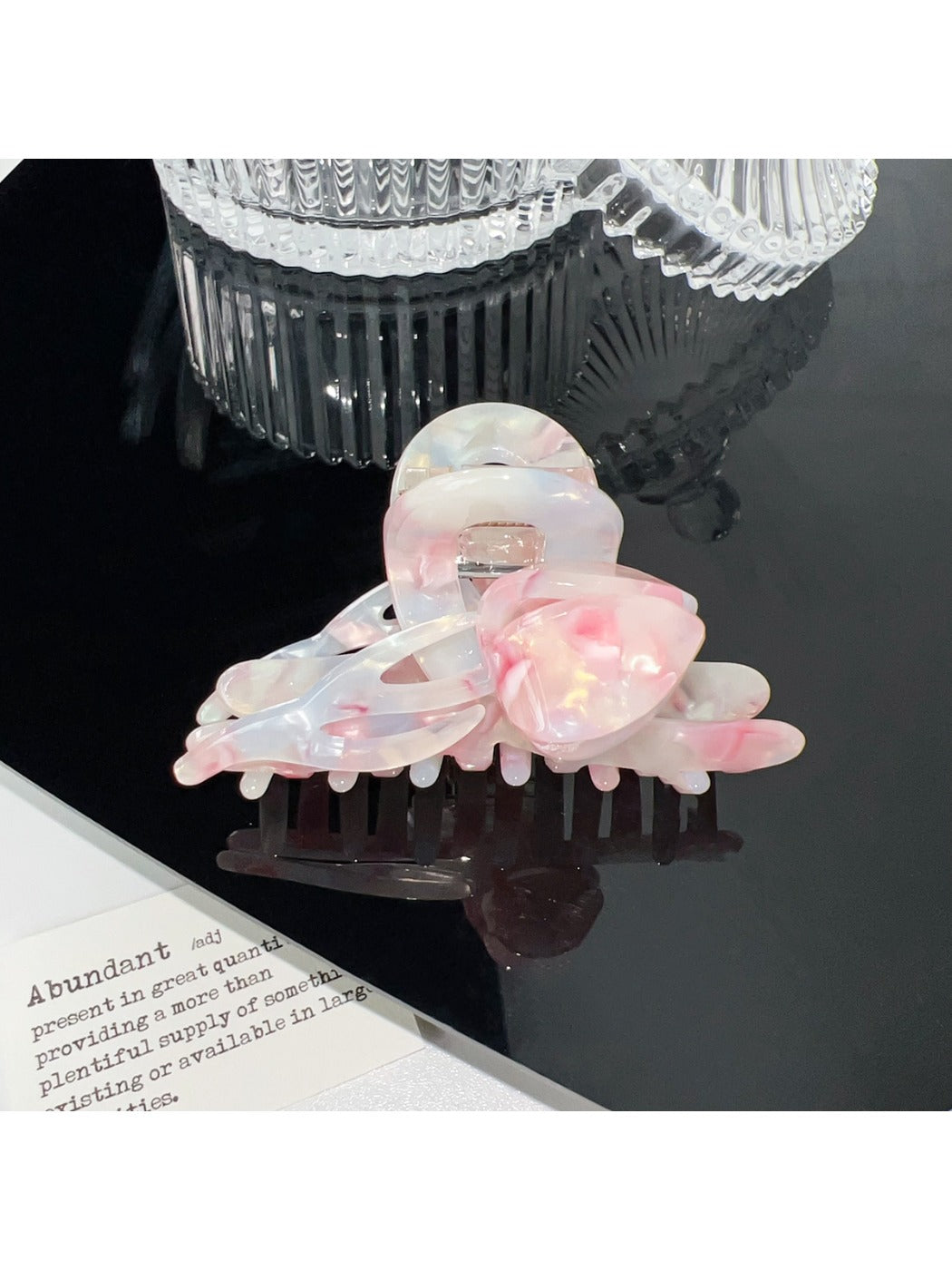 Beau hair claw clip displayed with matching floral accessories