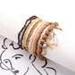 Close-up of Lovra bracelet showing ocean-themed pendant and detailed beadwork