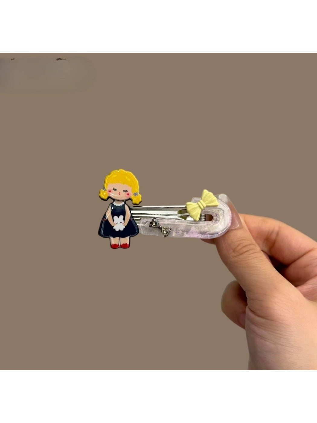 Side view of Beau cartoon hair clip displaying its secure clasp mechanism