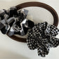 Vintage scrunchie with black and white check pattern displayed flat