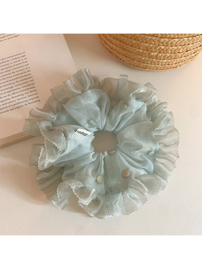 Gifty polka dot scrunchie displayed on a white background showing ruffled tulle texture