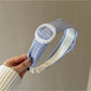 Gifty plaid circular headband displayed flat to show full pattern