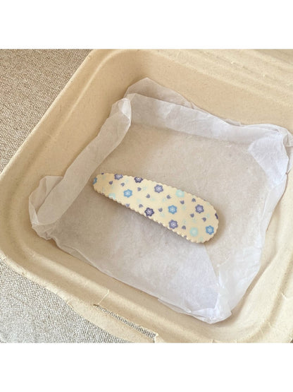Beau - Oval Star Shaped Floral Print Hair Clip