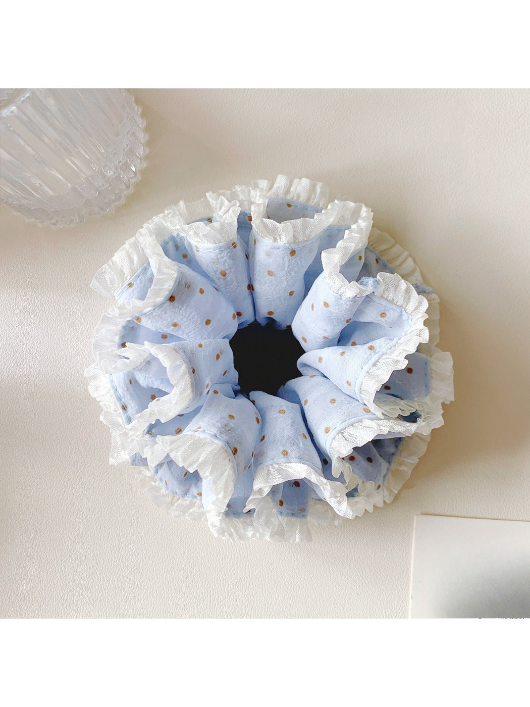Gifty polka dot double layer lace scrunchie styled in a ponytail on a model