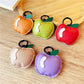 Small apple shaped keychain with red enamel finish and silver keyring