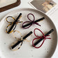 Beau - Openwork Bow Hair Clip
