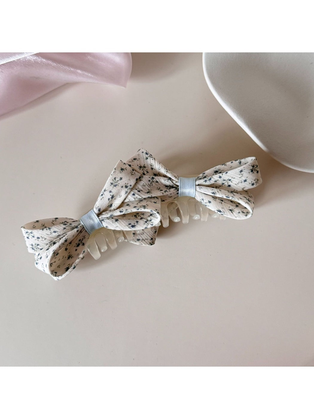Beau printed bow banana clip displayed on a white surface with natural lighting