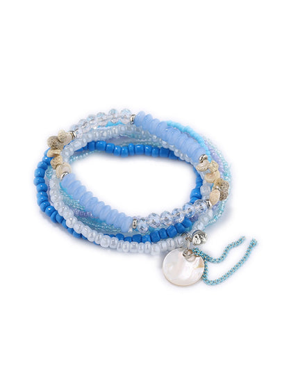 Model wearing Lovra colorful beaded bracelet paired with casual outfit