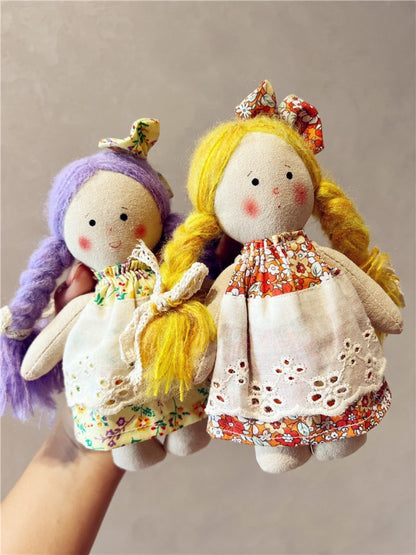 Back view of Keypus cartoon doll bag charm highlighting the keyring attachment