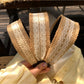 Side view of Gifty soft straw lace headband highlighting its flexible band