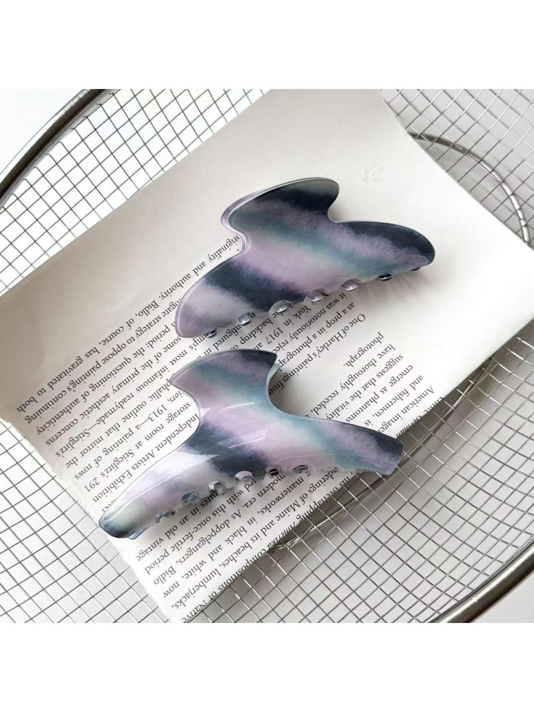 Beau hair claw clip open to display spring mechanism and teeth