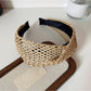 Close-up of the headband’s fabric edges and stitching details