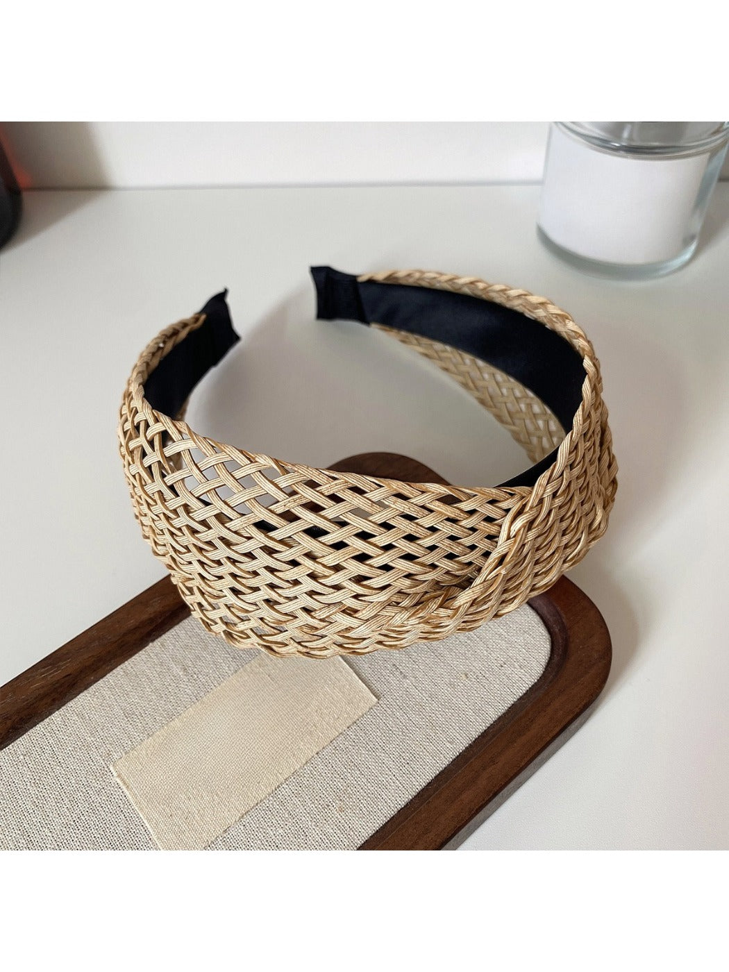 Close-up of the headband’s fabric edges and stitching details