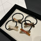 Gifty - Stylish X Shaped Hair Tie