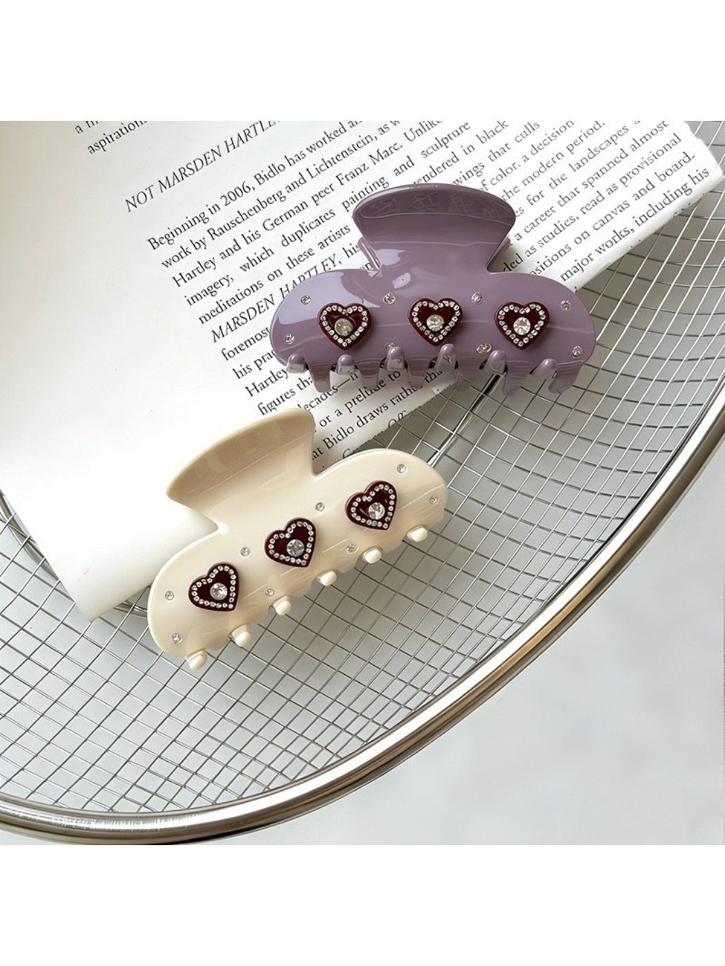 Close-up of Beau Sweet Heart Shaped Acetate Hair Clip showing glossy finish and clasp detail